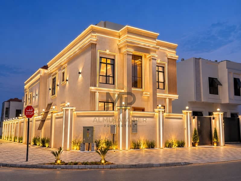 A luxurious 5-bedroom classic corner villa with a stone facade and high-end finishes, strategically located close to all services, including registrat, Al Helio