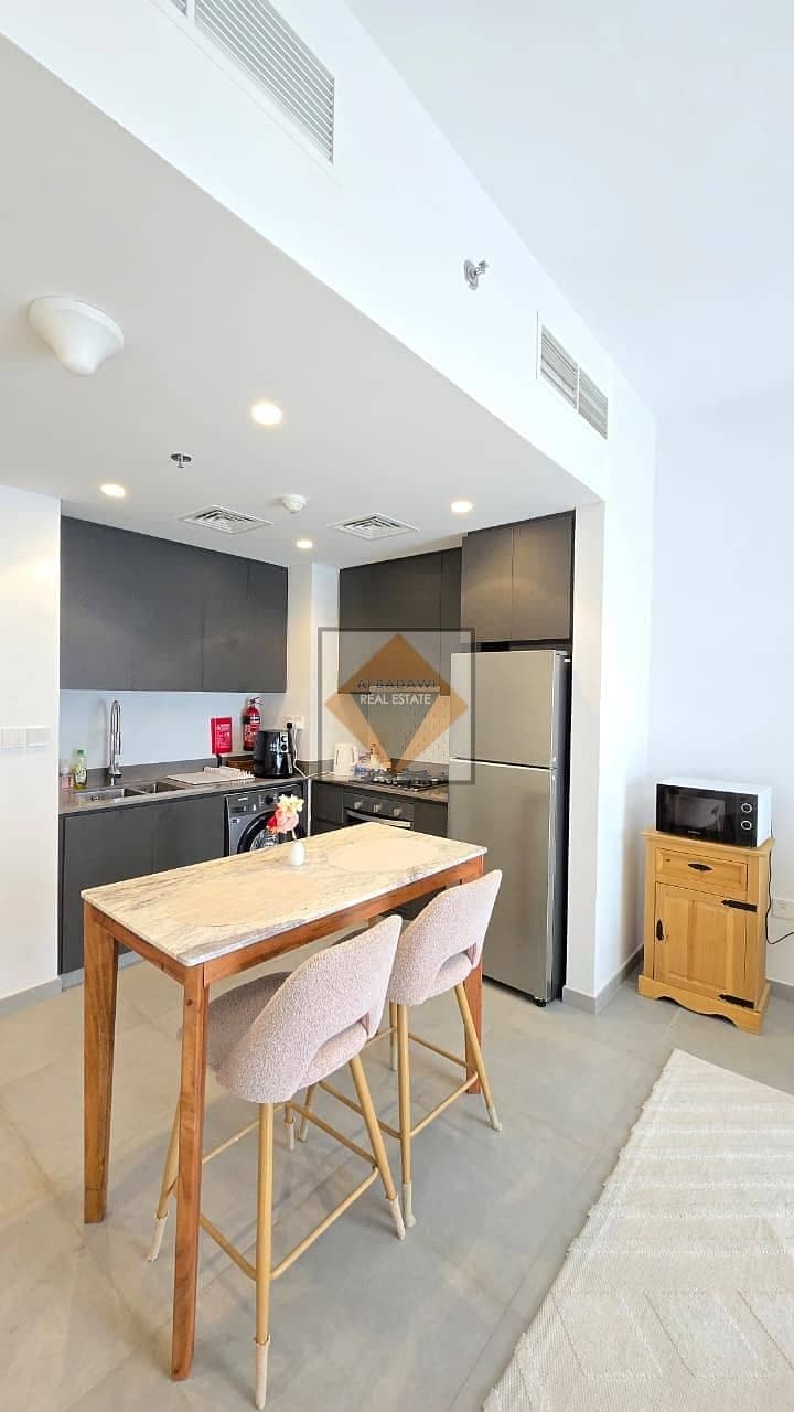 Fully Furnished 1-Bedroom Apartment for Sale in Tiraz 1, Aljada, Sharjah | Pool View | 709 Sq. Ft., photo 2