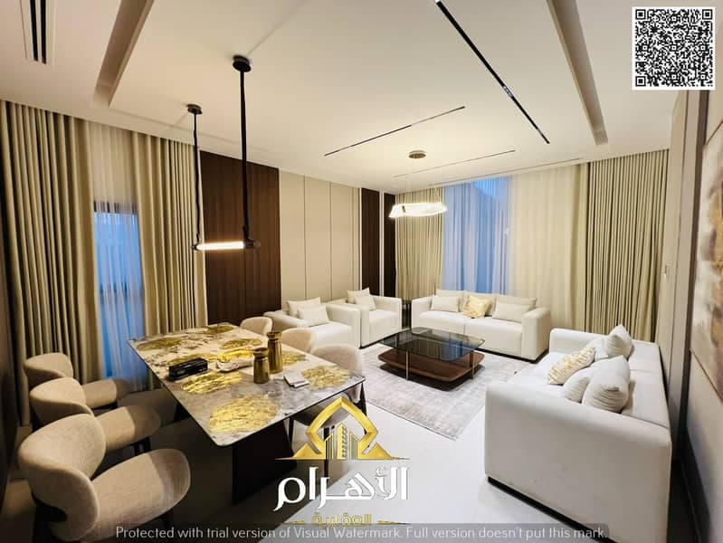 A modern villa in Al Helio, near Safir Hypermarket and the Dubai exit. It features a built-up area of 3,800 sq. ft. spanning the ground floor, first, photo 2
